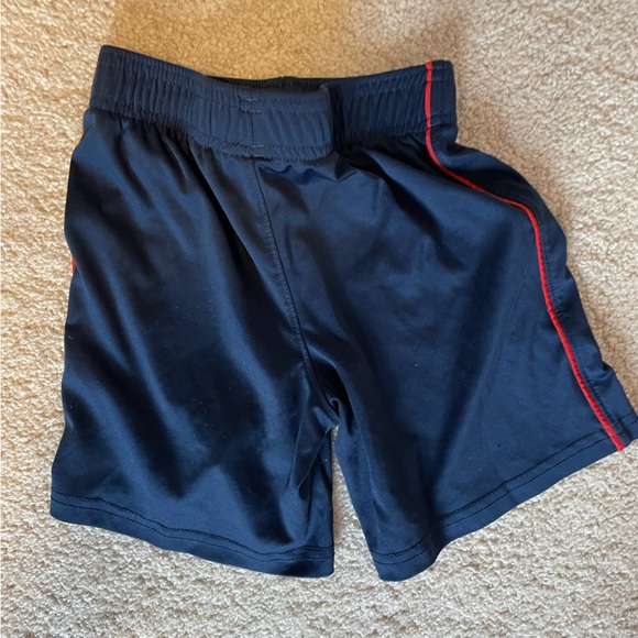 Size 5 boys under armour shorts. Navy with red piping. - Picture 2 of 3